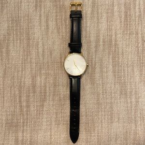 Black and Gold MVMT watch